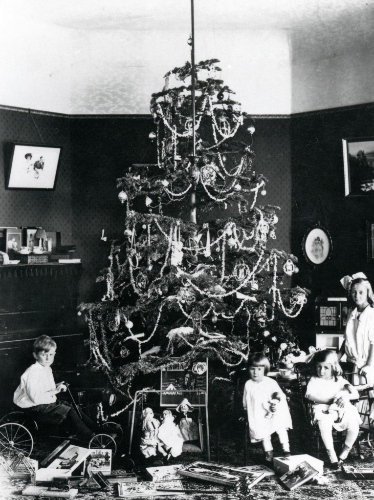 Christmas, 1917, in the Swain home, better known today as the Susanville Elks Lodge. Pictured are the Swain Children: Fitzhugh, Nellie, Blanche and Frances. Courtesy of Frances Swain